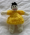 Caucasian, Yellow Dress, Black Hair With Curly Bangs