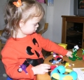 Peo playing with the Wiggle dolls