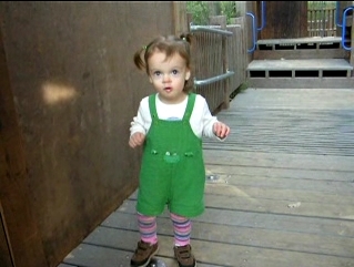 Peo stepping on bells in a wooden floor.