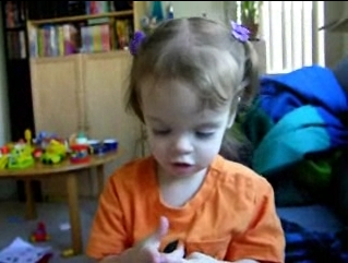 Peo looking at fingers.